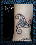 Celtic knot tattoo on a wrist with 'Lucky Fish' branding. Tattoo by Pat Fish.