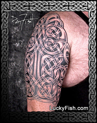 Tattoo of Celtic knot design by Pat Fish on a person's upper arm with LuckyFish.com branding.