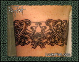 Celtic armband tattoo design of two dogs