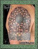 tattoo half sleeve with Celtic knotwork and dogs by Pat Fish