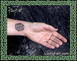 Celtic Yin-Yang Tattoo Design on wrist