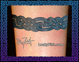 Celtic knot tattoo on a person's arm with 'Lucky Fish' branding.