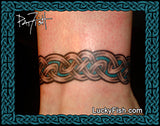 Celtic knot tattoo on a wrist with Lucky Fish branding.