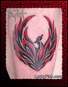 Tattoo design of a tribal phoenix made of flames with red and black feathers on skin, with Lucky Fish branding.
