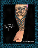 Tattoo forearm sleeve with intricate Nordic dragon patterns, featuring the brand 'Lucky Fish'.