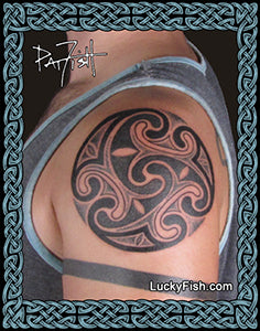 Celtic spiral tattoo on shoulder