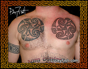 Person with Celtic tattoos on chest and shoulder, spiral wheel circles