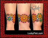 Colorful circular tattoos on a person's arm with 'Lucky Fish' branding.