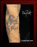 forearm tattoo of rampant royal Scottish lion