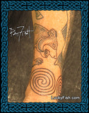 Tattoo of the Pictish Glamis stone bear and spiral design on a person's arm with 'LuckyFish.com' branding.