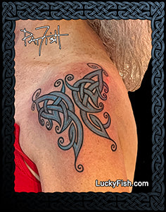 tribal butterfly tattoo on woman