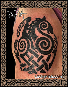 Tattoo of a Viking Nordic Sleipnir design on a person's arm with 'Lucky Fish' branding.