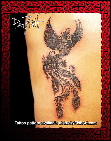 A black ink tattoo design of a stylized phoenix or bird with spread wings and flowing feather-like details, shown on skin with a decorative red Celtic knot border and text reading 'Pat Fish' and 'Tattoo pattern available at LuckyFishArt.com'.