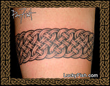 Celtic knot tattoo on a person's arm by Pat Fish with 'Lucky Fish' branding.