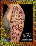 A black Pictish tribal-style spiral tattoo design shown on a person's upper arm, with the text LuckyFish.com and Pat Fish.