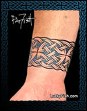 Celtic knot band tattoo on a person's wrist with 'Lucky Fish' branding.