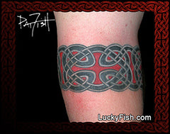 Celtic knot armband tattoo on a person's arm with LuckyFish branding.