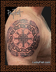 Nordic Celtic tattoo on a man's shoulder arm with Luckyfish.com branding