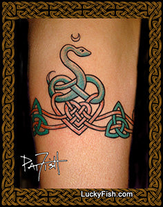 Celtic knot tattoo on a person's arm with a serpent snake and Celtic hearts and triquetras in an armband tattoo with  'Lucky Fish' branding.