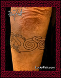 back view of heart and spirals in Celtic dragon armband