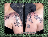 Floral tattoo design on shoulder with decorative patterns, with LuckyFish.com branding