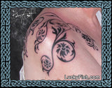 Tribal floral tattoo design on a shoulder with intricate patterns, by Pat Fish