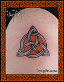 Celtic knot triangle tattoo on skin by Pat Fish with  'Lucky Fish.com' branding.