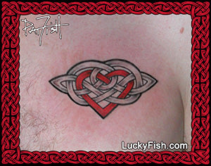 photo of Celtic knot heart tattoo on a person's chest with LuckyFish.com branding