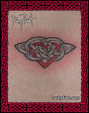 photo of Celtic knot heart tattoo with red heart on a person's chest with LuckyFish.com branding