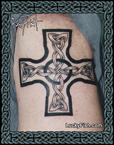 photo of Celtic cross tattoo on arm