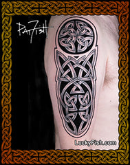 Tattoo design of a Celtic knot on an upper arm with 'Lucky Fish' branding.