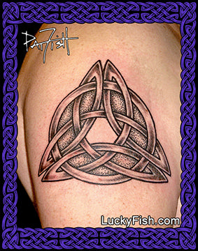 Celtic knot tattoo on a person's arm with 'Lucky Fish' branding.