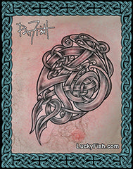 Celtic serpent tattoo on a chest by Pat Fish of LuckyFish.com