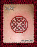 Circular red Celtic knot tattoo on skin with Lucky Fish branding.