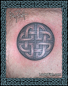 Celtic knot tattoo by Pat Fish on skin with LuckyFish.com website text.