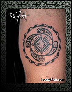 Black Hopi Indian tattoo of a circular design on a person's leg with 'Lucky Fish' branding.