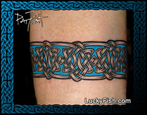 Celtic knot tattoo on a person's arm with 'Lucky Fish' branding.
