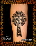 Celtic cross tattoo on a person's arm with 'Lucky Fish' branding.