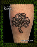 celtic knotwork shamrock tattoo on leg