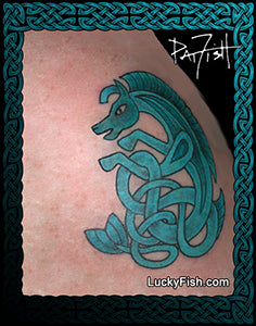Teal Celtic knot pony horse tattoo on skin with 'Lucky Fish' branding.