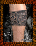 Tattoo design on a person's arm of a Celtic dog with knotwork with 'Lucky Fish' branding.