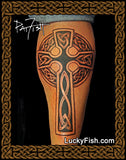 celtic cross tattoo on man's leg