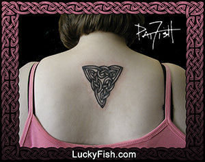 Woman wearing a pink top with a triangular Celtic knot tattoo on the upper back with LuckyFish branding