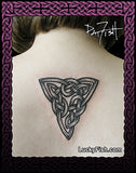 Celtic knot tattoo on a person's upper back with 'Lucky Fish' branding.