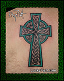 Celtic cross design tattoo with intricate patterns on a man's back by Pat Fish of LuckyFish.com.