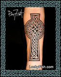 Celtic cross tattoo design by Pat Fish on a person's arm with 'Lucky Fish' branding.