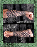 Two images of a person's arm with intricate tattoos, featuring the brand 'LuckyFish.com'.