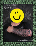 Disguised person with Celtic full sleeve knot  tattoo by Pat Fish and 'LuckyFish.com' branding