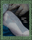 Close-up still from Boondock Saints movie of a tattoo with Celtic design on skin