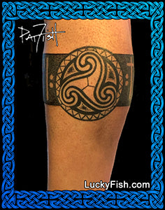 Wave Tattoo with Celtic Shield Design